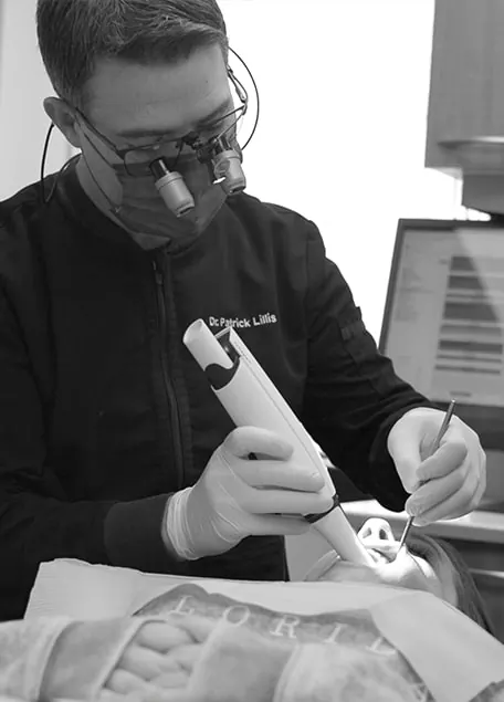 Dr. Lillis taking an intraoral scan of a patient
